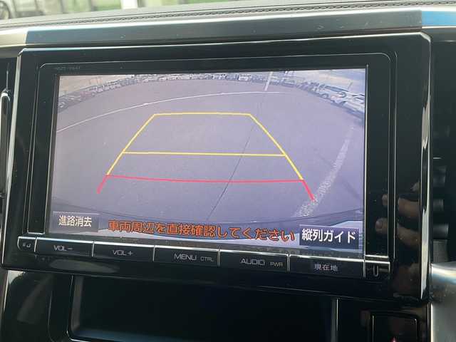 トヨタ ヴェルファイア ハイブリット ZR Gエディション 道東・釧路十勝 2015(平27)年 13.4万km ブラック ・純正9インチナビ/（AM・FM・CD・DVD・SD・BT・フルセグ）/・バックカメラ/・純正12.1インチフリップダウンモニター/・クルーズコントロール/・両側パワースライドドア/・パワーバックドア/・革シート/・運転席シートメモリー/・前席シートヒーター/・前席パワーシート/・助手席電動オットマン/・後席パワーシート・電動オットマン/・１００V　1500Wコンセント/・テレビキャンセラー/・クリアランスソナー/・オートライト/・オートマチックハイビーム/・ステアリングヒーター/・電動格納ミラー/・ウィンカーミラー/・社外アルミホイール/・保証書/・取扱説明書