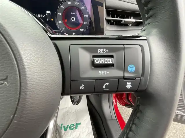 日産 オーラ G 香川県 2023(令5)年 1.5万km ガーネットレッド/スーパーブラック 2トーン 登録時走行距離：14519km/ワンオーナー　/純正ナビ（ＡｐｐｌＣａｒＰｌａｙ・ＡｎｄｒｏｉｄＡｕｔｏ・ＢＴ・フルセグ・HDMI）/ＵＳＢ入力端子　/全周囲カメラ　/ビルトインＥＴＣ２．０　/純正前後ドライブレコーダー　/前後クリアランスソナー/衝突軽減ブレーキ/車線維持支援システム/レーンディパーチャーアラート/アダブティブクルーズコントロール/ブラインドスポットモニター/ロードサインアシスト/駐車時支援パーキングサポートシステム/横滑り防止/インテリジェントルームミラー/BOSEサウンド/純正フロアマット/ハーフレザーシート/オートライト/オートマチックハイビーム/LEDヘッドライト/フォグライト/スマートキー/プッシュスタート/スペアキー1本/保証書/取扱説明書