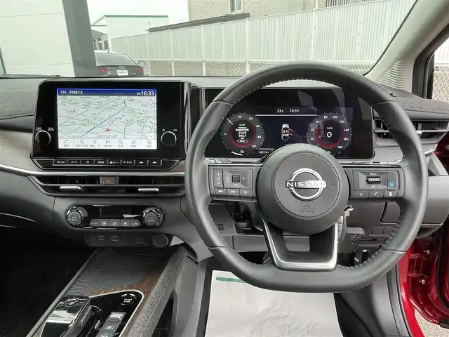 日産 オーラ G 香川県 2023(令5)年 1.5万km ガーネットレッド/スーパーブラック 2トーン 登録時走行距離：14519km/ワンオーナー　/純正ナビ（ＡｐｐｌＣａｒＰｌａｙ・ＡｎｄｒｏｉｄＡｕｔｏ・ＢＴ・フルセグ・HDMI）/ＵＳＢ入力端子　/全周囲カメラ　/ビルトインＥＴＣ２．０　/純正前後ドライブレコーダー　/前後クリアランスソナー/衝突軽減ブレーキ/車線維持支援システム/レーンディパーチャーアラート/アダブティブクルーズコントロール/ブラインドスポットモニター/ロードサインアシスト/駐車時支援パーキングサポートシステム/横滑り防止/インテリジェントルームミラー/BOSEサウンド/純正フロアマット/ハーフレザーシート/オートライト/オートマチックハイビーム/LEDヘッドライト/フォグライト/スマートキー/プッシュスタート/スペアキー1本/保証書/取扱説明書