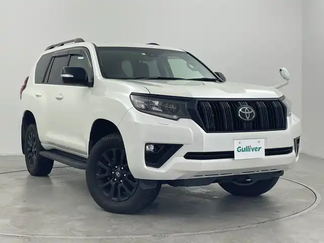 トヨタ ランドクルーザー プラド TX Lパッケージ マットブラED 群馬県 2023(令5)年 3.3万km ホワイトパールクリスタルシャイン サンルーフ　純正９型ナビ　バックカメラ　ウッドコンビステアリング　ルーフレール　黒革シート　エアシート　シートヒーター　ＥＴＣ２．０　ドラレコ　アダプティブクルーズコントロール　ＬＥＤライト　禁煙車