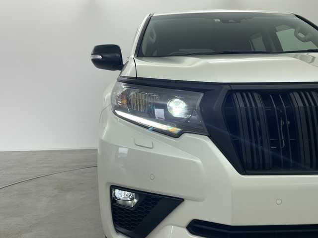 トヨタ ランドクルーザー プラド TX Lパッケージ マットブラED 群馬県 2023(令5)年 3.3万km ホワイトパールクリスタルシャイン サンルーフ　純正９型ナビ　バックカメラ　ウッドコンビステアリング　ルーフレール　黒革シート　エアシート　シートヒーター　ＥＴＣ２．０　ドラレコ　アダプティブクルーズコントロール　ＬＥＤライト　禁煙車