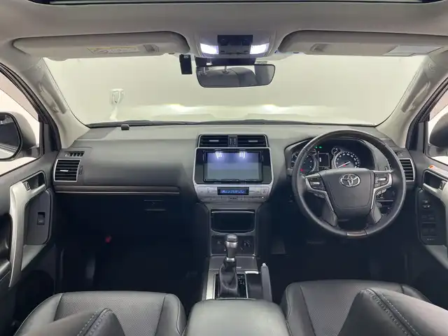 トヨタ ランドクルーザー プラド TX Lパッケージ マットブラED 群馬県 2023(令5)年 3.3万km ホワイトパールクリスタルシャイン サンルーフ　純正９型ナビ　バックカメラ　ウッドコンビステアリング　ルーフレール　黒革シート　エアシート　シートヒーター　ＥＴＣ２．０　ドラレコ　アダプティブクルーズコントロール　ＬＥＤライト　禁煙車