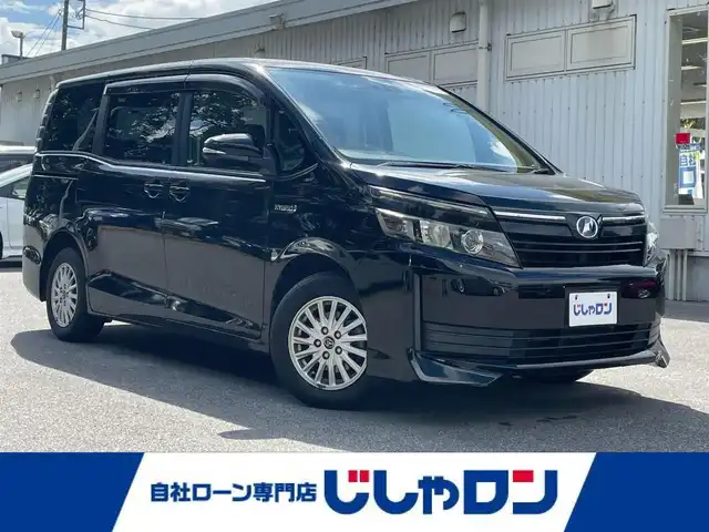 トヨタ ヴォクシー ハイブリッド X 栃木県 2014(平26)年 14.4万km ブラック (株)IDOMが運営する【じしゃロン宇都宮店】の自社ローン専用車両になります。こちらは現金またはオートローンご利用時の価格です。自社ローンご希望の方は別途その旨お申付け下さい/社外ナビ/バックカメラ/フルセグ/Ｂｌｕｅｔｏｏｔｈ/ＥＴＣ/片側パワースライドドア/アイドリングストップ/プッシュボタンスタート/スマートキー/純正アルミホイール/ＬＥＤヘッドライト/オートライト