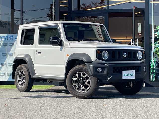 スズキ ジムニー シエラ JC 大阪府 2022(令4)年 2.6万km ピュアホワイトP スズキセーフティサポート/・デュアルセンサーブレーキサポート/・車線逸脱警報機能/・ふらつき警報機能/・先行車発信おしらせ機能/（車両進入禁止/はみ出し禁止/最高速度）/・ハイビームアシスト/社外9インチナビ/フルセグTV/CD/DVD/BT/USB/４WD/5速MT/ビルトインETC/クルーズコントロール/シートヒーター/アイドリングストップ/電動格納ミラー（ウィンカーミラー/ミラーヒーター）/アルパインスピーカー/ヘッドラインプウォッシャー/革巻きステアリング/シートカバー/色切り替えフォグライト/取説/保証書
