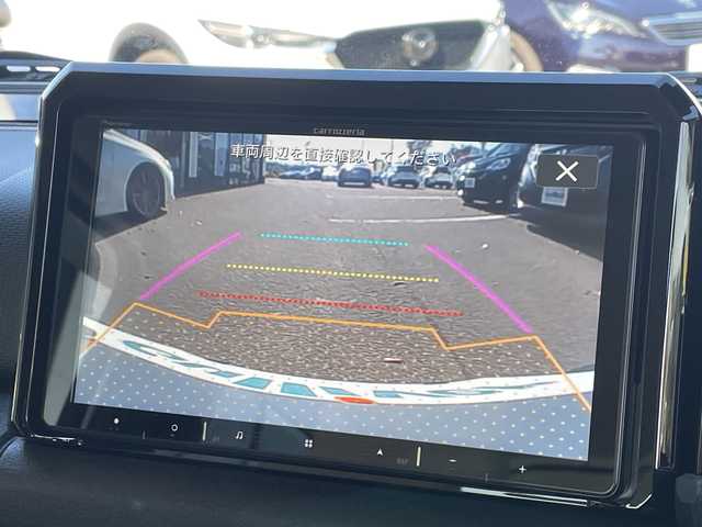 スズキ ジムニー シエラ JC 大阪府 2022(令4)年 2.6万km ピュアホワイトP スズキセーフティサポート/・デュアルセンサーブレーキサポート/・車線逸脱警報機能/・ふらつき警報機能/・先行車発信おしらせ機能/（車両進入禁止/はみ出し禁止/最高速度）/・ハイビームアシスト/社外9インチナビ/フルセグTV/CD/DVD/BT/USB/４WD/5速MT/ビルトインETC/クルーズコントロール/シートヒーター/アイドリングストップ/電動格納ミラー（ウィンカーミラー/ミラーヒーター）/アルパインスピーカー/ヘッドラインプウォッシャー/革巻きステアリング/シートカバー/色切り替えフォグライト/取説/保証書