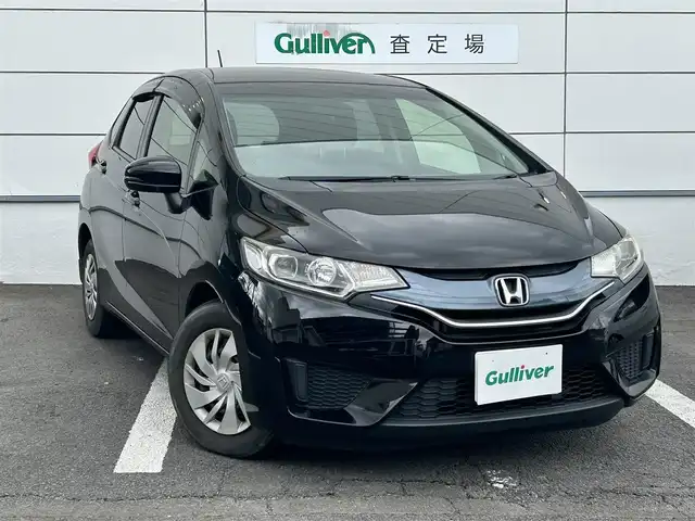 ホンダ フィット 13G Fパッケージ 長崎県 2015(平27)年 6.6万km クリスタルブラックパール ワンオーナー/社外メモリナビ/(CD/DVD/BT/フルセグ)/バックカメラ/ETC/オートライト/電動格納ミラー/スマートキー/プッシュスタート