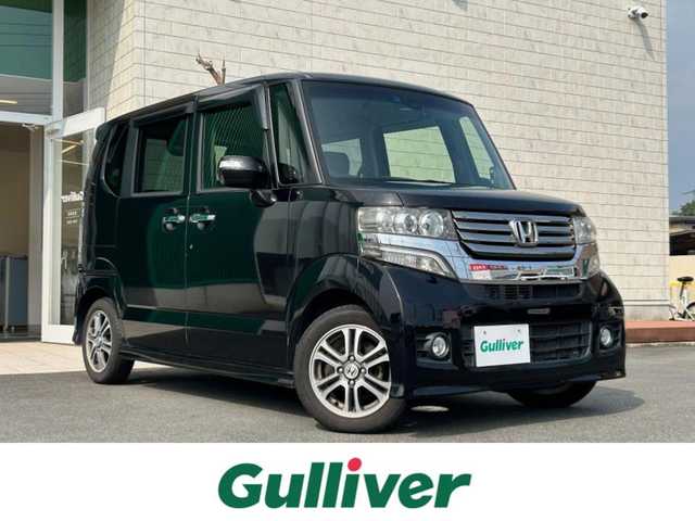 ホンダ Ｎ ＢＯＸ カスタム SSパッケージ 静岡県 2015(平27)年 6.3万km プレミアムゴールドパープルパール エンジンスタートボタン/パワーステアリング/パワーウィンドウ/保証書/取扱説明書/記録簿/オートエアコン/スマートキー/スペアキー１本/純正SDナビ（CD/BT/ワンセグ）/ドライブレコーダー前後/ベンチシート/フロアマット/両側パワースライドドア/純正アルミホイール/ABS/横滑り防止装置/盗難防止装置/オートライト/LEDヘッドライト/Wエアバック