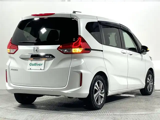 ホンダ フリード G ホンダセンシング 大阪府 2022(令4)年 1.5万km プラチナホワイトパール 純正ナビ バックカメラ ハーフレザー シートヒーター レーダークルコン 衝突軽減ブレーキ レーンアシスト 両側パワースライドドア オートライト アイドリングストップ ETC