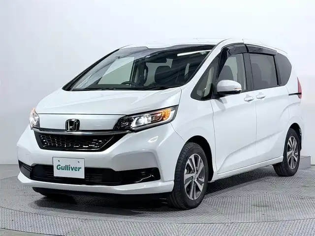 ホンダ フリード G ホンダセンシング 大阪府 2022(令4)年 1.5万km プラチナホワイトパール 純正ナビ バックカメラ ハーフレザー シートヒーター レーダークルコン 衝突軽減ブレーキ レーンアシスト 両側パワースライドドア オートライト アイドリングストップ ETC
