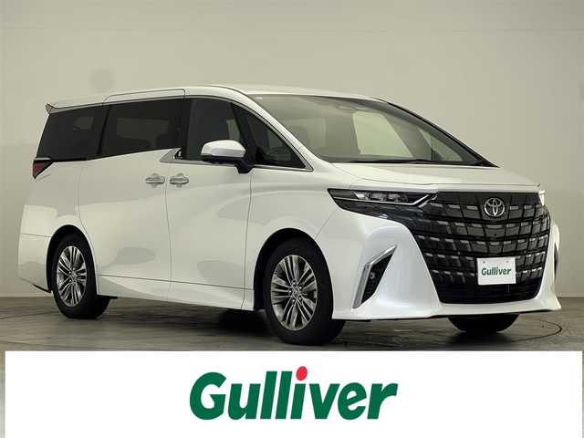 トヨタ アルファード Z 滋賀県 2024(令6)年 1.3万km プラチナホワイトパールマイカ 禁煙車/左右独立ムーンルーフ/純正１４型ナビ/【フルセグＴＶ/Bluetooth//AppleCarPlay/AndroidAuto】/ＥＴＣ２．０/全方位カメラ/Toyota Safety Sense/・プリクラッシュセーフティ/・緊急時操舵支援（アクティブ操舵機能付）/・フロントクロストラフィックアラート/・レーンチェンジアシスト/・レーントレーシングアシスト/・レーンディパーチャーアラート/・レーダークルーズコントロール/・アダプティブハイビームシステム/・オートマチックハイビーム/・ロードサインアシスト/・ドライバー異常時対応システム/・プロアクティブドライビングアシスト/・発進遅れ告知機能/BSM/レザーシート/エグゼクティブパワーシート/・シートヒーター/・シートベンチレーション/ハンドルヒーター/両側パワースライドドア/パワーバックドア