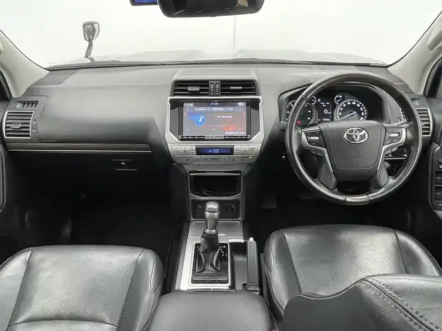 トヨタ ランドクルーザー プラド TX Lパッケージ 千葉県 2019(令1)年 6.3万km アティチュードブラックマイカ TRDエアロパーツ/社外メモリーナビ/フルセグTV/Bluetooth/CD/DVD/USB/バックカメラ/前方ドライブレコーダー/純正ビルトインETC/サンルーフ/レザーシート/電動格納サードシート/パワーシート/シートヒーター/シートクーラー/ルーフレール/追従クルーズコントロール/ダウンヒルアシストコントロール/社外サイドドアバイザー/フォグライト/LEDヘッドライト