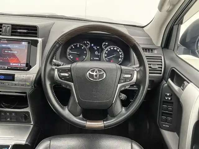 トヨタ ランドクルーザー プラド TX Lパッケージ 千葉県 2019(令1)年 6.3万km アティチュードブラックマイカ TRDエアロパーツ/社外メモリーナビ/フルセグTV/Bluetooth/CD/DVD/USB/バックカメラ/前方ドライブレコーダー/純正ビルトインETC/サンルーフ/レザーシート/電動格納サードシート/パワーシート/シートヒーター/シートクーラー/ルーフレール/追従クルーズコントロール/ダウンヒルアシストコントロール/社外サイドドアバイザー/フォグライト/LEDヘッドライト