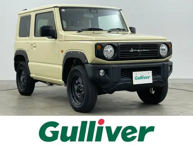 スズキ ジムニー XL 岡山県 2019(平31)年 4.9万km シフォンアイボリーM 純正8インチナビ（CN-RZ843）/・FM/AM/Bluetooth/フルセグ/CD/DVD/バックカメラ/シートヒーター/ETC/社外フロントグリル/スズキセーフティーサポート/・衝突軽減ブレーキ/・車線逸脱警報/・オートハイビーム/オートライト/・フォグライト/オートエアコン/純正フロアマット/背面タイヤ/スマートキー