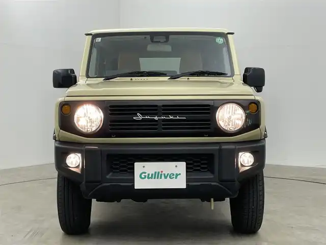 スズキ ジムニー XL 岡山県 2019(平31)年 4.9万km シフォンアイボリーM 純正8インチナビ（CN-RZ843）/・FM/AM/Bluetooth/フルセグ/CD/DVD/バックカメラ/シートヒーター/ETC/社外フロントグリル/スズキセーフティーサポート/・衝突軽減ブレーキ/・車線逸脱警報/・オートハイビーム/オートライト/・フォグライト/オートエアコン/純正フロアマット/背面タイヤ/スマートキー