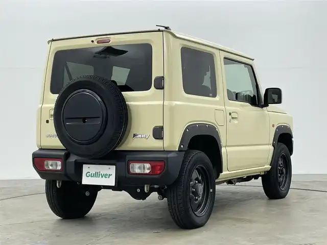 スズキ ジムニー XL 岡山県 2019(平31)年 4.9万km シフォンアイボリーM 純正8インチナビ（CN-RZ843）/・FM/AM/Bluetooth/フルセグ/CD/DVD/バックカメラ/シートヒーター/ETC/社外フロントグリル/スズキセーフティーサポート/・衝突軽減ブレーキ/・車線逸脱警報/・オートハイビーム/オートライト/・フォグライト/オートエアコン/純正フロアマット/背面タイヤ/スマートキー