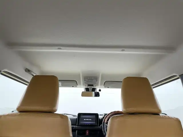 スズキ ジムニー XL 岡山県 2019(平31)年 4.9万km シフォンアイボリーM 純正8インチナビ（CN-RZ843）/・FM/AM/Bluetooth/フルセグ/CD/DVD/バックカメラ/シートヒーター/ETC/社外フロントグリル/スズキセーフティーサポート/・衝突軽減ブレーキ/・車線逸脱警報/・オートハイビーム/オートライト/・フォグライト/オートエアコン/純正フロアマット/背面タイヤ/スマートキー