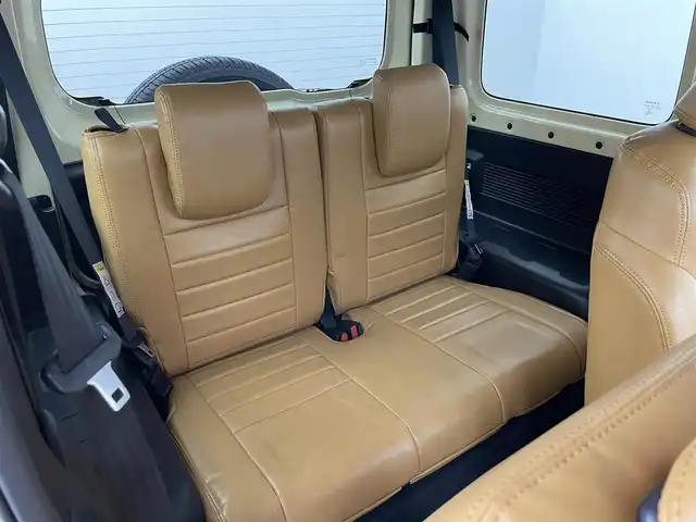 スズキ ジムニー XL 岡山県 2019(平31)年 4.9万km シフォンアイボリーM 純正8インチナビ（CN-RZ843）/・FM/AM/Bluetooth/フルセグ/CD/DVD/バックカメラ/シートヒーター/ETC/社外フロントグリル/スズキセーフティーサポート/・衝突軽減ブレーキ/・車線逸脱警報/・オートハイビーム/オートライト/・フォグライト/オートエアコン/純正フロアマット/背面タイヤ/スマートキー