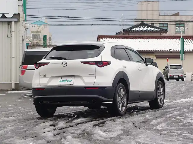 マツダ ＣＸ－３０ XD Lパッケージ 山形県 2020(令2)年 7万km スノーフレイクホワイトパールマイカ 4WD/軽油/衝突被害軽減システム/BOSEサウンド/純正メモリナビ/　　【CD DVD BT フルセグ USB AUX】/全周囲カメラ/電動リアゲート/レーダークルーズコントロール/LEDオートヘッドライト/レザーシート/パワーシート/シートヒーター/純正18インチアルミホイール/コーナーセンサー/アイドリングストップ/ステアリングスイッチ/パドルシフト/ターボ/電動格納ウィンカーミラー/スマートキー×2/ETC