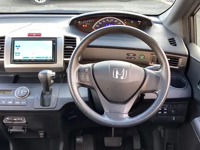 ホンダ フリード スパイク G ジャストセレクション 大阪府 2013(平25)年 13.1万km モダンスティールM ワンオーナー/社外SDナビ・フルセグTV・/　　ＣＤ・DVD・Bluetooth/両側パワースライドドア/ＨＩＤオートヘッドライト/スマートキー2個/バックカメラ/スカイルーフ/ビルトインＥＴＣ/ステアリングスイッチ/ヒルスタートアシスト/電動格納ウインカーミラー