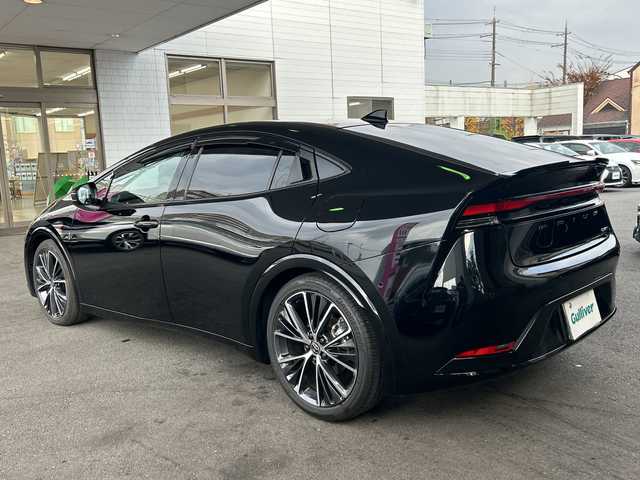 トヨタ プリウス Z 京都府 2023(令5)年 1万km アティチュードブラックマイカ 純正12.3インチディスプレイナビ/フルセグテレビ/アラウンドビューモニター/Miracast/ワイヤレス充電/Bluetooth/デジタルインナーミラー/メモリーパワーシート/シートヒーター＆ベンチレーション/ステアリングヒーター/トヨタセーフティーセンス/アドバンスドパーク/ブラインドスポットモニター/クリアランスソナー/プリクラシュセーフティー/リヤクロストラフィックアラート/ロードサインアシスト/レーダークルーズコントロール/プロアクティブドライビングアシスト/ワンオーナー/禁煙車/ビルトインETC2.0/ウィンカーミラー/電動格納ミラー
