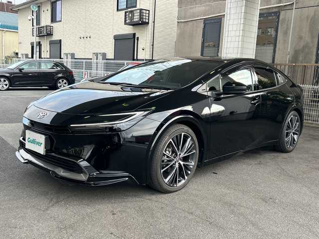 トヨタ プリウス Z 京都府 2023(令5)年 1万km アティチュードブラックマイカ 純正12.3インチディスプレイナビ/フルセグテレビ/アラウンドビューモニター/Miracast/ワイヤレス充電/Bluetooth/デジタルインナーミラー/メモリーパワーシート/シートヒーター＆ベンチレーション/ステアリングヒーター/トヨタセーフティーセンス/アドバンスドパーク/ブラインドスポットモニター/クリアランスソナー/プリクラシュセーフティー/リヤクロストラフィックアラート/ロードサインアシスト/レーダークルーズコントロール/プロアクティブドライビングアシスト/ワンオーナー/禁煙車/ビルトインETC2.0/ウィンカーミラー/電動格納ミラー