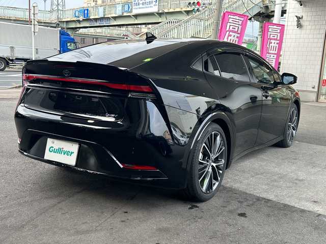 トヨタ プリウス Z 京都府 2023(令5)年 1万km アティチュードブラックマイカ 純正12.3インチディスプレイナビ/フルセグテレビ/アラウンドビューモニター/Miracast/ワイヤレス充電/Bluetooth/デジタルインナーミラー/メモリーパワーシート/シートヒーター＆ベンチレーション/ステアリングヒーター/トヨタセーフティーセンス/アドバンスドパーク/ブラインドスポットモニター/クリアランスソナー/プリクラシュセーフティー/リヤクロストラフィックアラート/ロードサインアシスト/レーダークルーズコントロール/プロアクティブドライビングアシスト/ワンオーナー/禁煙車/ビルトインETC2.0/ウィンカーミラー/電動格納ミラー
