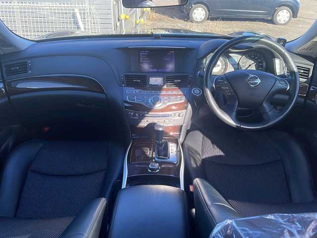 日産 フーガ 250GT 道東・釧路十勝 2012(平24)年 7.5万km ガーネットブラック 純正HDDナビ/　(AM/FM/CD/AUX)/フルセグTV/バックカメラ/ハーフレザーシート/純正前後ドライブレコーダー/クルーズコントロール/前席パワーシート/メモリシート/横滑り防止装置/助手席オットマン/前後コーナーセンサー/革巻きステアリング/ステアリングスイッチ/LEDヘッドライト/スペアキー