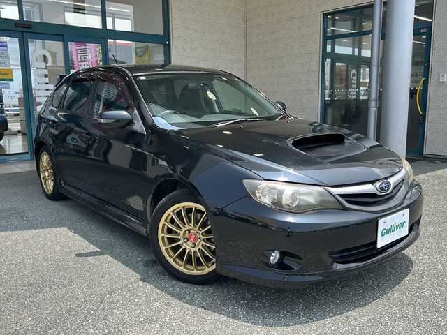 スバル インプレッサ 2．0GT 愛知県 2011(平23)年 15.6万km オブシディアンブラックパール 登録時155421Km/社外7インチメモリナビ/(ワンセグTV/DVD/AUX)/クルーズコントロール/ドラレコ前/革巻きステアリング/社外17インチAW(O・Z RACING)/社外マフラー(HKS)/社外強化クラッチ/ETC/スマートキー/(スペアキー×1)/取説/保証書