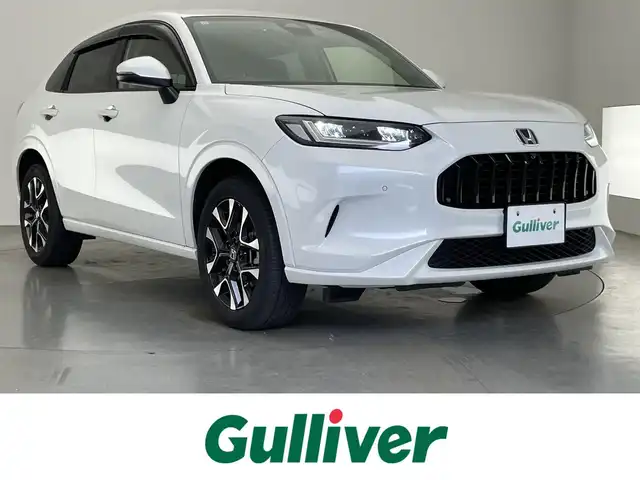 ホンダ ＺＲ－Ｖ ハイブリッド e:HEV Z 愛知県 2023(令5)年 1.5万km プラチナホワイトパール 純正９型ナビ　全方位カメラ　ＢＯＳＥ　禁煙　茶革　シートヒーター　ワイヤレス充電　ＥＴＣ２．０　電動パーキング　メモリシート　ホンダセンシング　衝突軽減装置　追従クルコン　ハンドル支援　電動リアゲート