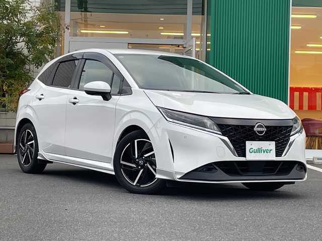 日産 ノート X 岡山県 2021(令3)年 3.1万km ピュアホワイトパール 純正9インチディスプレイオーディオ/フルセグTV、Bluetooth、AM、FM/AppleCarplay、AndroidAuto/ビルトインETC/全方位カメラ/インテリジェントルームミラー/純正ドライブレコーダー/ワイヤレス充電/USB電源ソケット/インテリジェントエマージェンシーブレーキ/標識検知機能/駐車支援/後退時車両検知機能/ふらつき警報/側方支援/後側方支援/速度標識表示/フロント＆バックソナー/エクステリアパッケージ/・フロントバンパーフィニッシャー/・サイドフィルフィニッシャー/・リアバンパーフィニッシャー