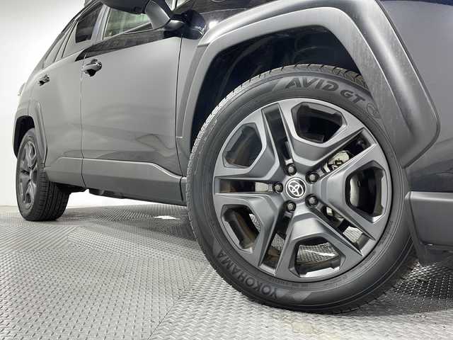 トヨタ ＲＡＶ４ アドベンチャー 広島県 2023(令5)年 0.5万km アティチュードブラックマイカ パノラマムーンルーフ/TRDフルエアロ/純正10.5型ディスプレイオーディオ/デジタルインナーミラー/ブラインドスポットモニター/バックカメラ/ブラック合皮シート/シートヒーター/ベンチレーション/パワーシート/ポジションメモリー/ステアリングヒーター/パワーバックドア/ダウンヒルアシストコントロール/マルチテレインセレクト/セーフティセンス/・プリクラッシュセーフティ/・レーントレーシングアシスト/・オートマチックハイビーム/・レーダークルーズコントロール/LEDヘッドランプ/純正19インチAW/ルーフレール/ETC2.0/USB入力端子