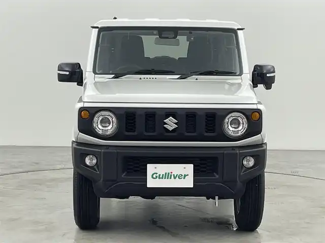 スズキ ジムニー XC 福岡県 2024(令6)年 0.1万km未満 ピュアホワイトP 登録済未使用車　/社外ナビ（フルセグＴＶ）　/ＥＴＣ　/前方ドライブレコーダー　/クルーズコントロール　/コーナーセンサー　/衝突被害軽減ブレーキ　/レーンキープ　/ヒルディセントコントロール　/シートヒーター　/ＬＥＤ