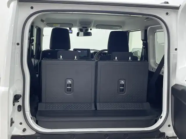 スズキ ジムニー XC 福岡県 2024(令6)年 0.1万km未満 ピュアホワイトP 登録済未使用車　/社外ナビ（フルセグＴＶ）　/ＥＴＣ　/前方ドライブレコーダー　/クルーズコントロール　/コーナーセンサー　/衝突被害軽減ブレーキ　/レーンキープ　/ヒルディセントコントロール　/シートヒーター　/ＬＥＤ
