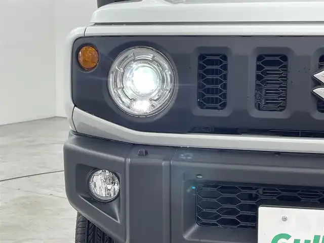 スズキ ジムニー XC 福岡県 2024(令6)年 0.1万km未満 ピュアホワイトP 登録済未使用車　/社外ナビ（フルセグＴＶ）　/ＥＴＣ　/前方ドライブレコーダー　/クルーズコントロール　/コーナーセンサー　/衝突被害軽減ブレーキ　/レーンキープ　/ヒルディセントコントロール　/シートヒーター　/ＬＥＤ