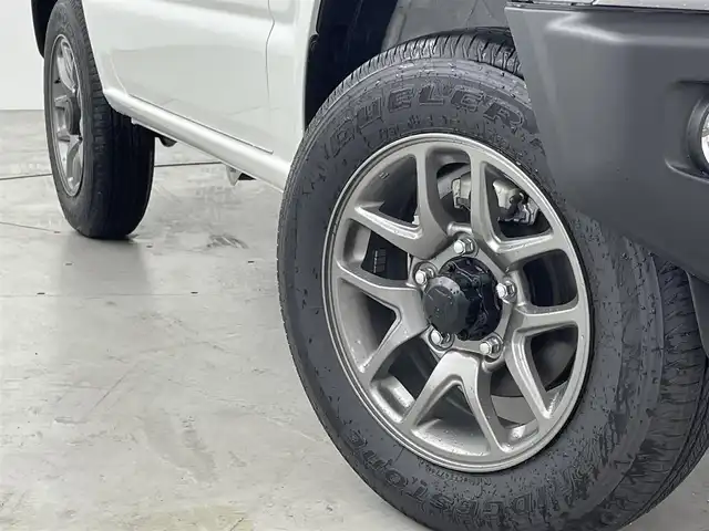 スズキ ジムニー XC 福岡県 2024(令6)年 0.1万km未満 ピュアホワイトP 登録済未使用車　/社外ナビ（フルセグＴＶ）　/ＥＴＣ　/前方ドライブレコーダー　/クルーズコントロール　/コーナーセンサー　/衝突被害軽減ブレーキ　/レーンキープ　/ヒルディセントコントロール　/シートヒーター　/ＬＥＤ