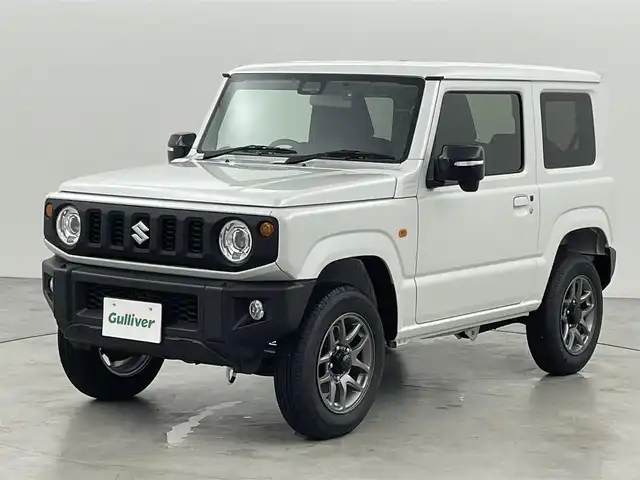 スズキ ジムニー XC 福岡県 2024(令6)年 0.1万km未満 ピュアホワイトP 登録済未使用車　/社外ナビ（フルセグＴＶ）　/ＥＴＣ　/前方ドライブレコーダー　/クルーズコントロール　/コーナーセンサー　/衝突被害軽減ブレーキ　/レーンキープ　/ヒルディセントコントロール　/シートヒーター　/ＬＥＤ