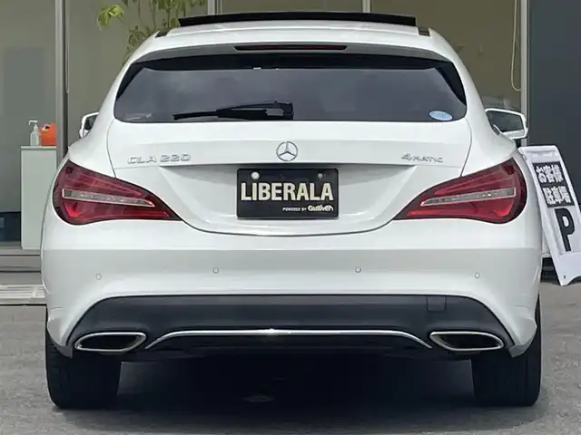 メルセデス・ベンツ ＣＬＡ２２０ Sブレイク 4MATIC 青森県 2018(平30)年 4.4万km ポーラホワイト /4WD/ターボ/ハーマンカードン/　サウンドシステム/純正ナビ/　（Bt/CD/DVD/USB/フルセグTV)/バックカメラ/サンルーフ/衝突軽減ブレーキ/ACC/アンビエントライト/LEDオートライト/ブラインドスポットモニター/パドルシフト/前席メモリー付きパワーシート/前席シートヒーター/黒レザーシート/パワーバックドア/前後クリアランスソナー/ステアリングスイッチ/革巻きステアリング/リア7面プライバシーガラス/プッシュスタート/スペアキー/保証書/取扱説明書