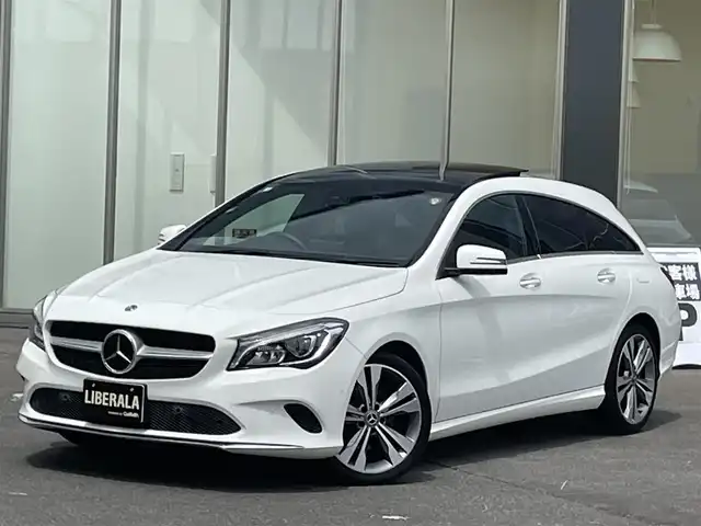 メルセデス・ベンツ ＣＬＡ２２０ Sブレイク 4MATIC 青森県 2018(平30)年 4.4万km ポーラホワイト /4WD/ターボ/ハーマンカードン/　サウンドシステム/純正ナビ/　（Bt/CD/DVD/USB/フルセグTV)/バックカメラ/サンルーフ/衝突軽減ブレーキ/ACC/アンビエントライト/LEDオートライト/ブラインドスポットモニター/パドルシフト/前席メモリー付きパワーシート/前席シートヒーター/黒レザーシート/パワーバックドア/前後クリアランスソナー/ステアリングスイッチ/革巻きステアリング/リア7面プライバシーガラス/プッシュスタート/スペアキー/保証書/取扱説明書