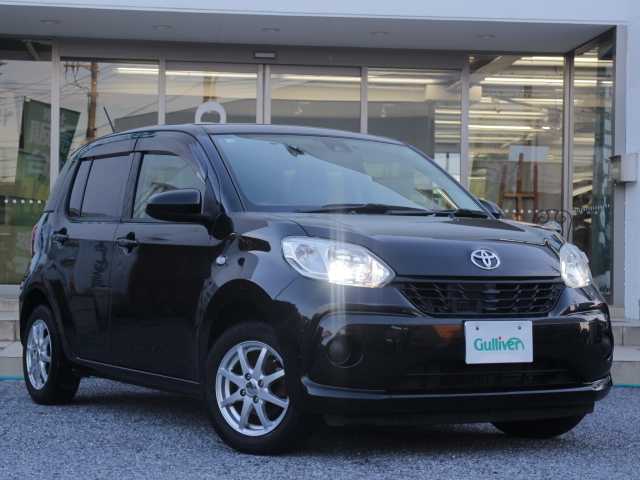 トヨタ パッソ X Gパッケージ 千葉県 2018(平30)年 4.8万km ブラックマイカメタリック ワンオーナー/純正ナビ(SDナビ)/フルセグＴＶ/Ｂｌｕｅｔｏｏｔｈ/ＣＤ再生/ＤＶＤ再生/AM / FM/純正ドラレコ（前側）/ビルトインＥＴＣ２．０/アイドリングストップ/衝突軽減ブレーキ/横滑り防止装置/スマートキー/スペアキー（スマートキー）/純正ホイール＋サマータイヤ4本有ります。/（165/65R14 2018年33週 サイドヒビ有り 約4mm）/社外14インチホイール＋スタッドレスタイヤ/（165/65R14 2017年48週 装着中 約5mm）/純正フロアマット/ドアバイザー/取説/保証書