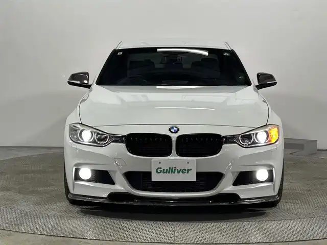 ＢＭＷ ３２０ｄ ブルーパフォーマンス Mスポーツ 大阪府 2013(平25)年 13.1万km アルピンホワイトⅢ iDriveナビゲーションシステム/バックカメラ/キセノンヘッドライト/オートライト/コンフォートアクセス/社外18インチAW/D/N席パワーシート/フロント/トランクスポイラー/カーボンドアミラーカバー/ステアリングスイッチ