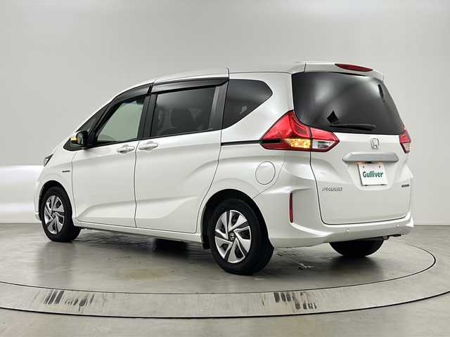 ホンダ フリード ハイブリット G ホンダセンシング 埼玉県 2021(令3)年 2.1万km プラチナホワイトパール 純正ナビ/バックカメラ　/ビルトインＥＴＣ　/両側電動スライドドア　/ＥＣＯＮ　/前後ドライブレコーダー　/シートヒーター　/純正フロアマット　/ウインカーミラー　/ドアバイザー　/ＬＥＤヘッドライト　/フォグランプ　/スマートキー/プッシュスタート