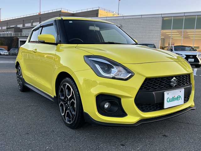 スズキ スイフト スポーツ 山梨県 2018(平30)年 7万km チャンピオンイエロー 6速MT/社外ナビ/バックカメラ/フルセグTV/CD/DVD/BT/ETC/純正17インチアルミホイール/ステアリングリモコン/クルーズコントロール/スマートキー/スペアキー1本/運転席シートヒーター/純正フロアマット