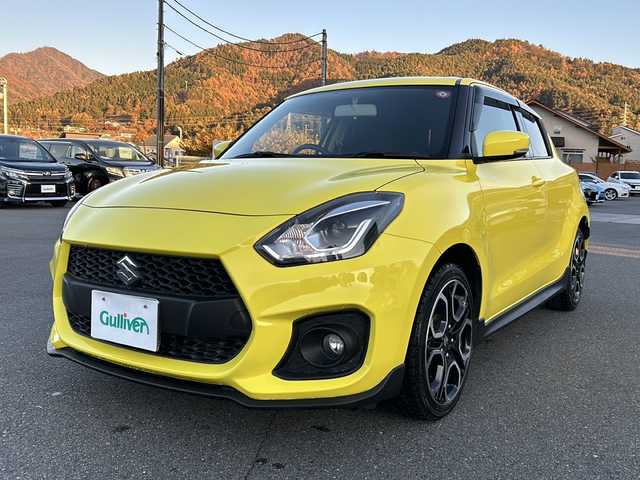 スズキ スイフト スポーツ 山梨県 2018(平30)年 7万km チャンピオンイエロー 6速MT/社外ナビ/バックカメラ/フルセグTV/CD/DVD/BT/ETC/純正17インチアルミホイール/ステアリングリモコン/クルーズコントロール/スマートキー/スペアキー1本/運転席シートヒーター/純正フロアマット