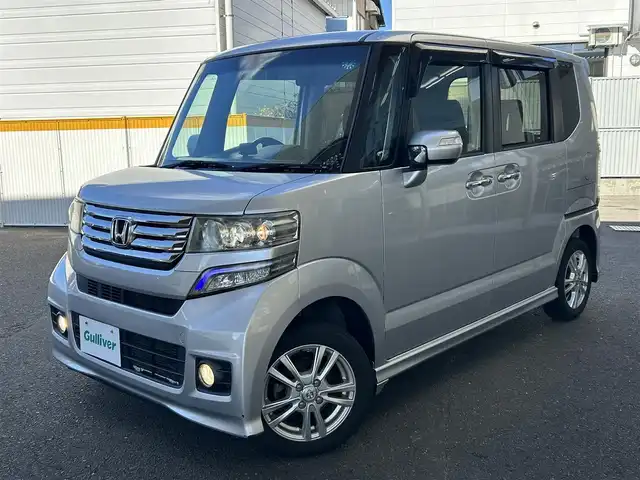 ホンダ Ｎ ＢＯＸ ＋ カスタム G ターボパッケージ 宮城県 2013(平25)年 12.7万km アラバスターシルバーメタリック ・ワンオーナー/・ナビ/（カロッツェリア）/（フルセグTV/CD/DVD/Bluetooth/Smart Usen)/・前ドライブレコーダー/・バックカメラ/・アイドリングストップ/・両側パワースライドドア/・革ステアリング/・ステアリングスイッチ/・パドルシフト/・電動格納ウィンカーミラー/・HIDライト/・オートライト/・フロントフォグランプ/・ISOFIX/・ETC/・GPS/(ASSURA)/(AR-G600A)/・バイザー/・夏タイヤ/・Wエアバッグ/ABS/・スマートキー/・スペアキー×1/・プッシュスタート/・盗難防止センサー/・横滑り防止装置/・取扱説明書