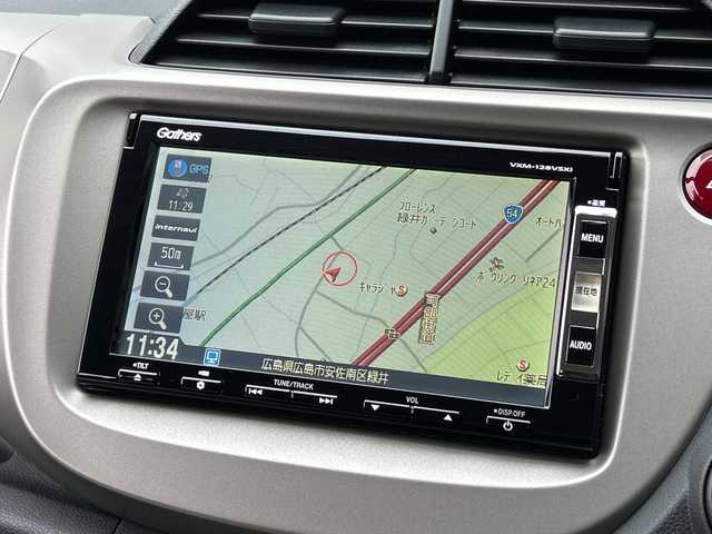 ホンダ フィット ハイブリット 広島県 2012(平24)年 1.9万km プレミアムホワイトパール 禁煙/純正ナビ（VXM-128VSXi）/・ワンセグ/CD/DVD/SD/クルーズコントロール/ＥＣＯＮ/ヘッドライトレベライザー/ＬＥＤドアミラーウインカー/オートエアコン/純正フロアマット