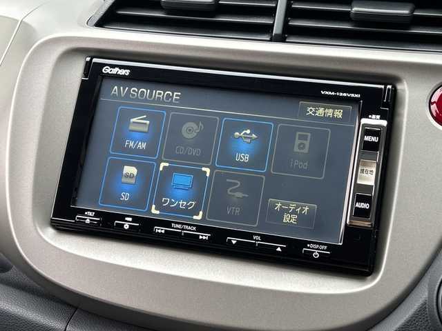 ホンダ フィット ハイブリット 広島県 2012(平24)年 1.9万km プレミアムホワイトパール 禁煙/純正ナビ（VXM-128VSXi）/・ワンセグ/CD/DVD/SD/クルーズコントロール/ＥＣＯＮ/ヘッドライトレベライザー/ＬＥＤドアミラーウインカー/オートエアコン/純正フロアマット