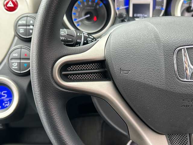 ホンダ フィット ハイブリット 広島県 2012(平24)年 1.9万km プレミアムホワイトパール 禁煙/純正ナビ（VXM-128VSXi）/・ワンセグ/CD/DVD/SD/クルーズコントロール/ＥＣＯＮ/ヘッドライトレベライザー/ＬＥＤドアミラーウインカー/オートエアコン/純正フロアマット