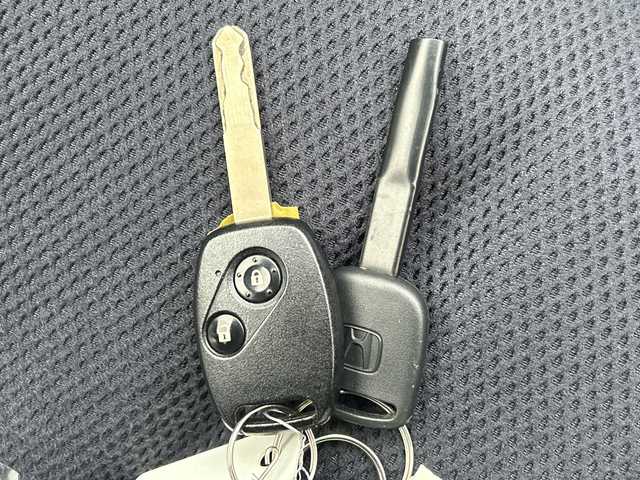 ホンダ フィット ハイブリット 広島県 2012(平24)年 1.9万km プレミアムホワイトパール 禁煙/純正ナビ（VXM-128VSXi）/・ワンセグ/CD/DVD/SD/クルーズコントロール/ＥＣＯＮ/ヘッドライトレベライザー/ＬＥＤドアミラーウインカー/オートエアコン/純正フロアマット