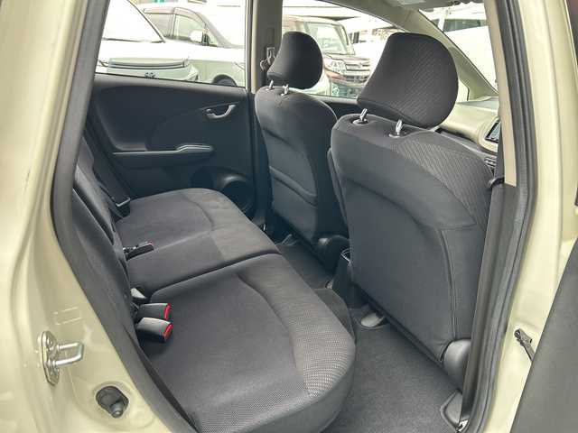 ホンダ フィット ハイブリット 広島県 2012(平24)年 1.9万km プレミアムホワイトパール 禁煙/純正ナビ（VXM-128VSXi）/・ワンセグ/CD/DVD/SD/クルーズコントロール/ＥＣＯＮ/ヘッドライトレベライザー/ＬＥＤドアミラーウインカー/オートエアコン/純正フロアマット