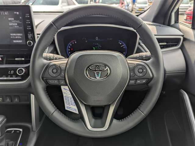 トヨタ カローラ クロス Z 福井県 2023(令5)年 2.7万km プラチナホワイトパールマイカ ワンオーナー車/純正18インチAW/電動リアゲート/全車速自動追従機能付クルーズコントロール/前後ドライブレコーダー/前後コーナーセンサー/LEDヘッドライト/バックカメラ/運転席パワーシート/純正メモリナビ/フルセグテレビ/レーンキープアシスト/盗難防止装置/横滑り防止装置/シートヒーター/ビルトインETC/ダブル＋サイドエアバッグ/カーテンエアバッグ/純正フロアマット